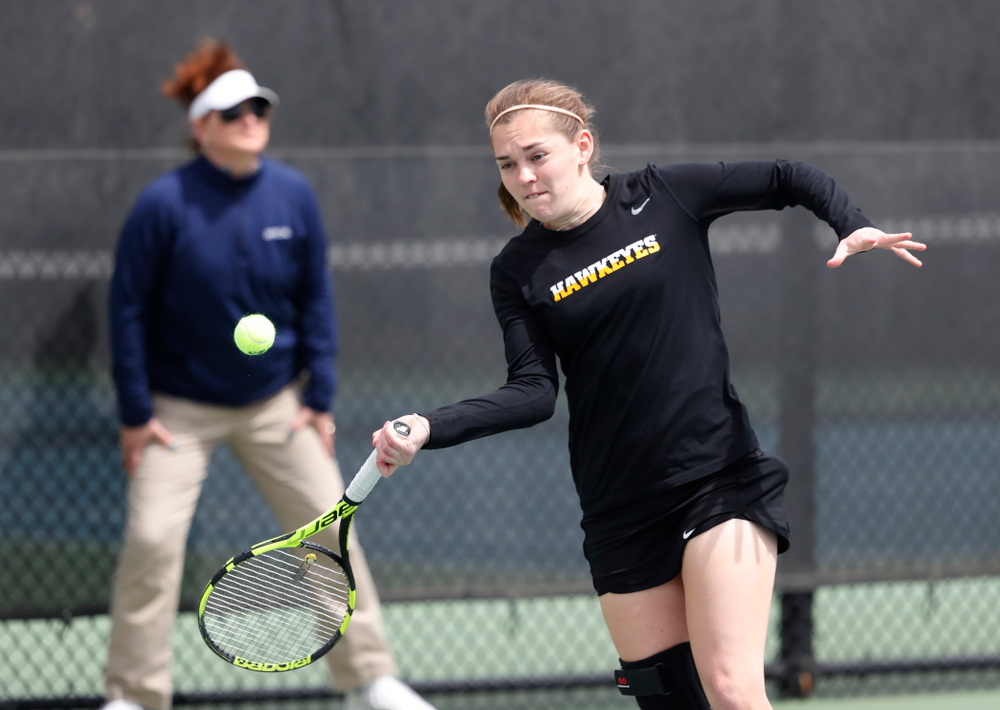 Adorabol Huckleby and Zoe Douglas play a doubles match against the Wisconsin Badgers Sunday, April 22, 2018 at the Hawkeye Tennis and Recreation Center. (Brian Ray/hawkeyesports.com)