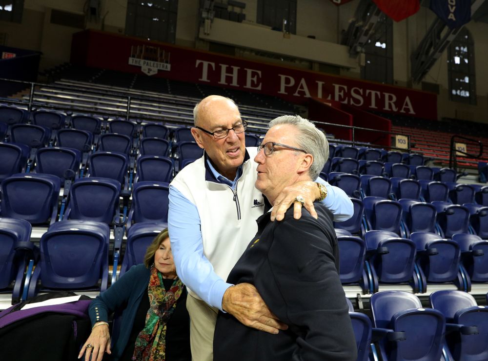 Iowa Hawkeyes head coach Fran McCaffery talks with Bob Weinhauer, his head coach from Penn, before practice at the Palestra Friday, January 3, 2020 in Philadelphia. (Brian Ray/hawkeyesports.com)