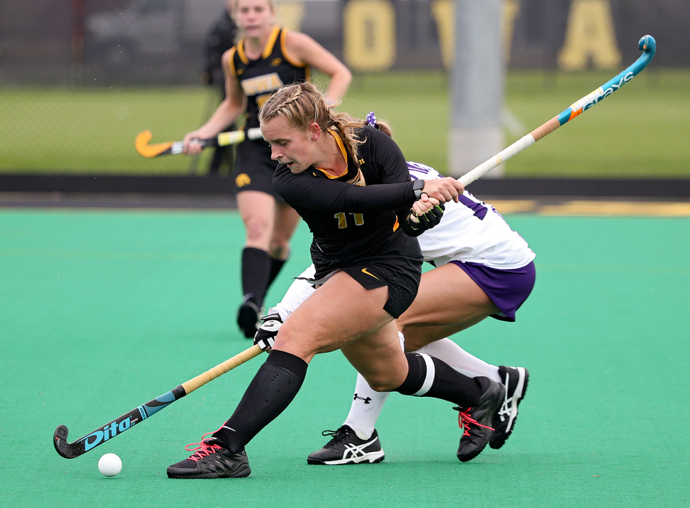 Iowa’s Katie Birch (11) lines up a shot during the second quarter of their game at Grant Field in Iowa City on Saturday, Oct 26, 2019. (Stephen Mally/hawkeyesports.com)