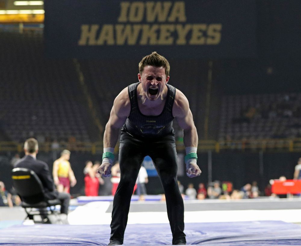 Iowa's Jake Brodarzon is pumped up after competing in the rings during the first day of the Big Ten Men's Gymnastics Championships at Carver-Hawkeye Arena in Iowa City on Friday, Apr. 5, 2019. (Stephen Mally/hawkeyesports.com)
