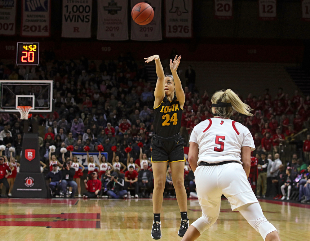 Iowa guard Gabbie Marshall (24) makes a 3-pointer during the first quarter of their game at the Rutgers Athletic Center in Piscataway, N.J. on Sunday, March 1, 2020. (Stephen Mally/hawkeyesports.com)