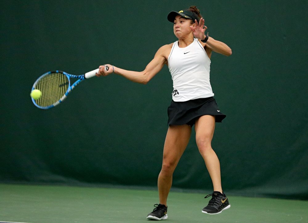 Iowa’s Michelle Bacalla returns a shot during her singles match at the Hawkeye Tennis and Recreation Complex in Iowa City on Sunday, February 16, 2020. (Stephen Mally/hawkeyesports.com)