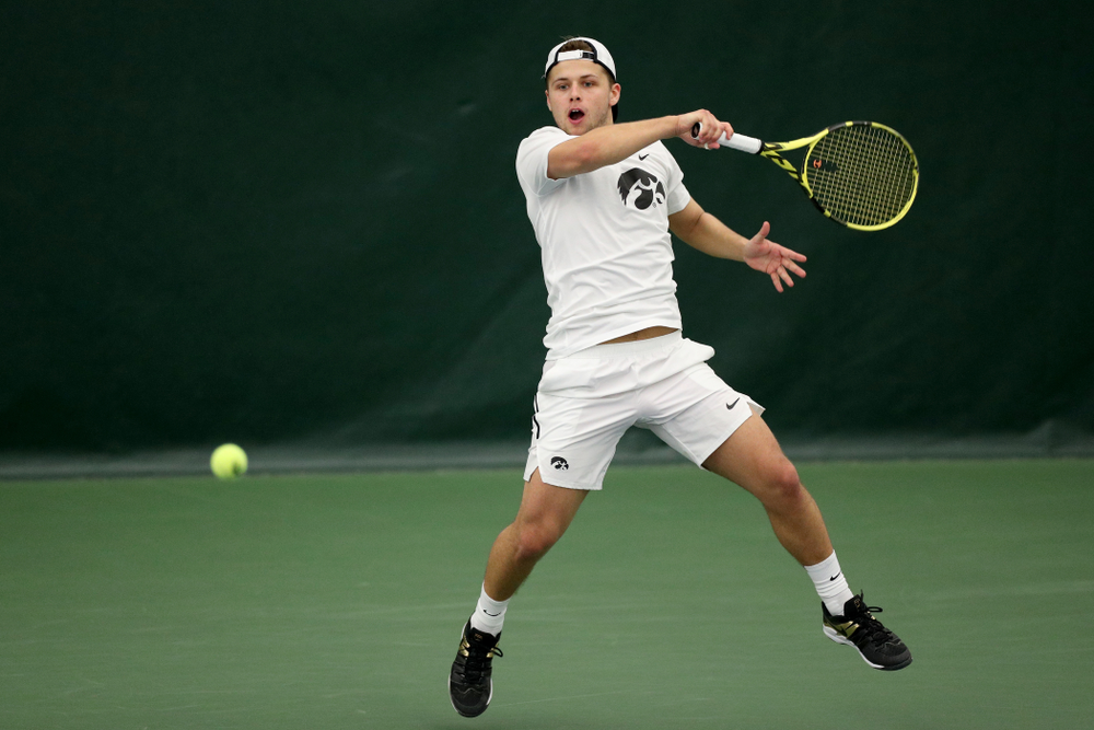 Iowa’s Will Davies against Cornell Sunday, March 8, 2020 at the Hawkeye Tennis and Recreation Center. (Brian Ray/hawkeyesports.com)
