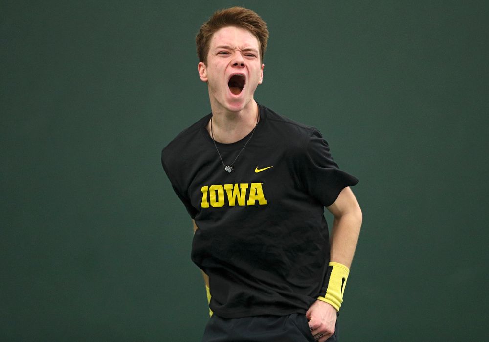 Iowa’s Jason Kerst celebrates a point during his match against Marquette at the Hawkeye Tennis and Recreation Complex in Iowa City on Saturday, January 25, 2020. (Stephen Mally/hawkeyesports.com)