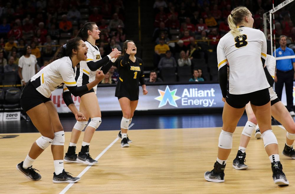 Iowa Hawkeyes setter Brie Orr (7) celebrates after winning a point during a match against Nebraska at Carver-Hawkeye Arena on November 7, 2018. (Tork Mason/hawkeyesports.com)