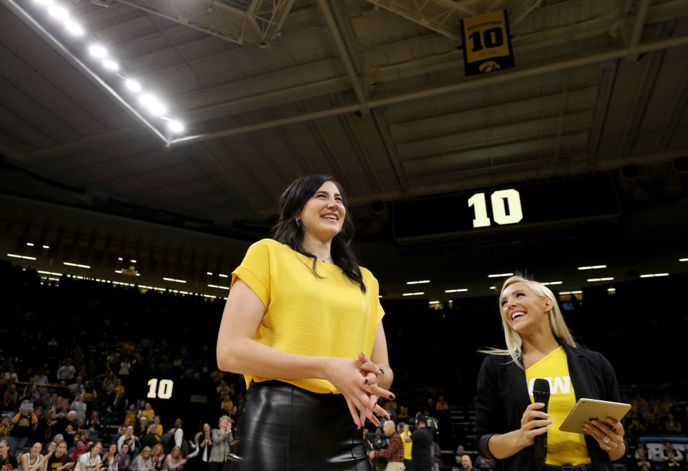 Megan Gustafson smiles after her number was raised into the rafters during a jersey retirement ceremony Sunday, January 26, 2020 at Carver-Hawkeye Arena. (Brian Ray/hawkeyesports.com)