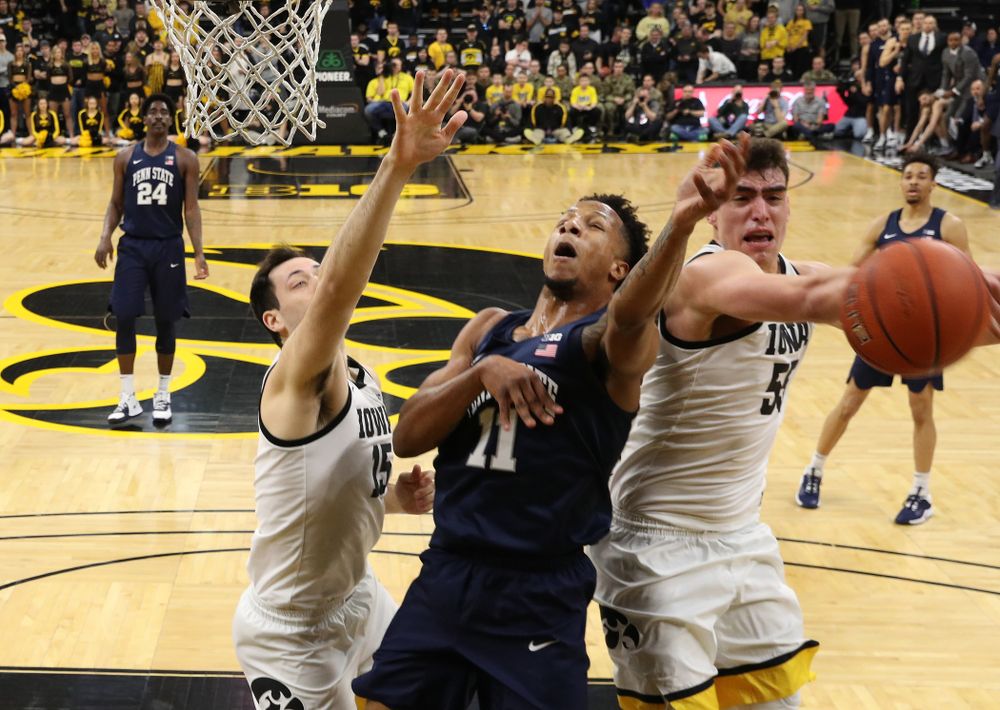 Iowa Hawkeyes forward Luka Garza (55) blocks a shot against Penn State Saturday, February 29, 2020 at Carver-Hawkeye Arena. (Brian Ray/hawkeyesports.com)