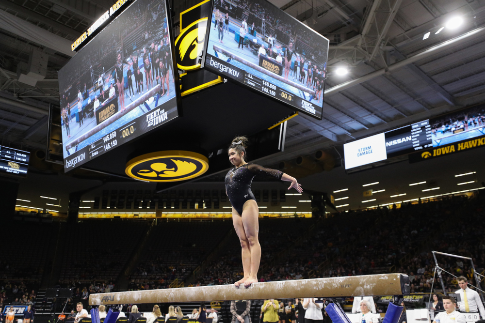 Iowa's Nicole Chow competes on the beem against Illinois Saturday, February 16, 2019 at Carver-Hawkeye Arena. (Brian Ray/hawkeyesports.com)