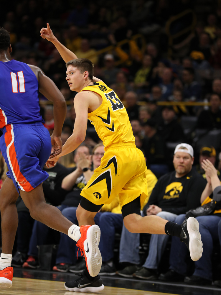 Iowa Hawkeyes guard Austin Ash (13) against the Savannah State Tigers Saturday, December 22, 2018 at Carver-Hawkeye Arena. (Brian Ray/hawkeyesports.com)