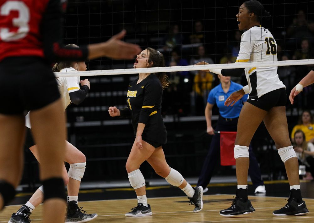 Iowa Hawkeyes defensive specialist Molly Kelly (1) celebrates after winning a point during a match against Rutgers at Carver-Hawkeye Arena on November 2, 2018. (Tork Mason/hawkeyesports.com)