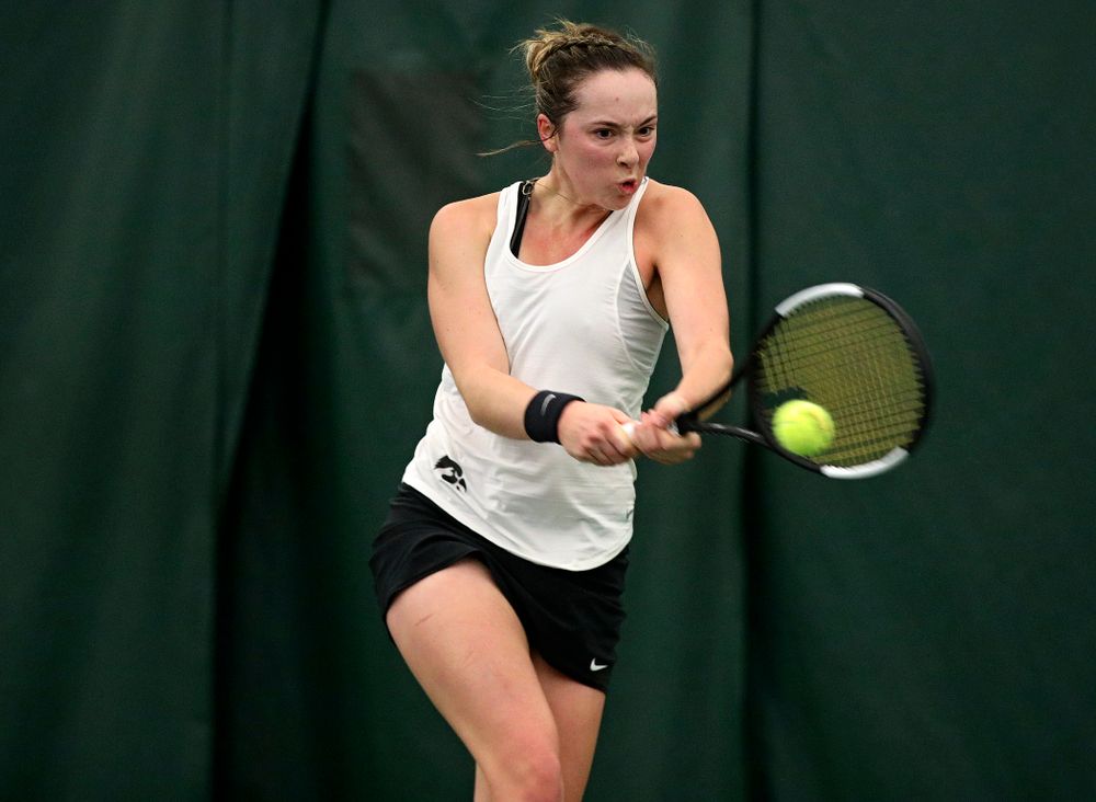 Iowa’s Samantha Mannix returns a shot during her singles match at the Hawkeye Tennis and Recreation Complex in Iowa City on Sunday, February 23, 2020. (Stephen Mally/hawkeyesports.com)