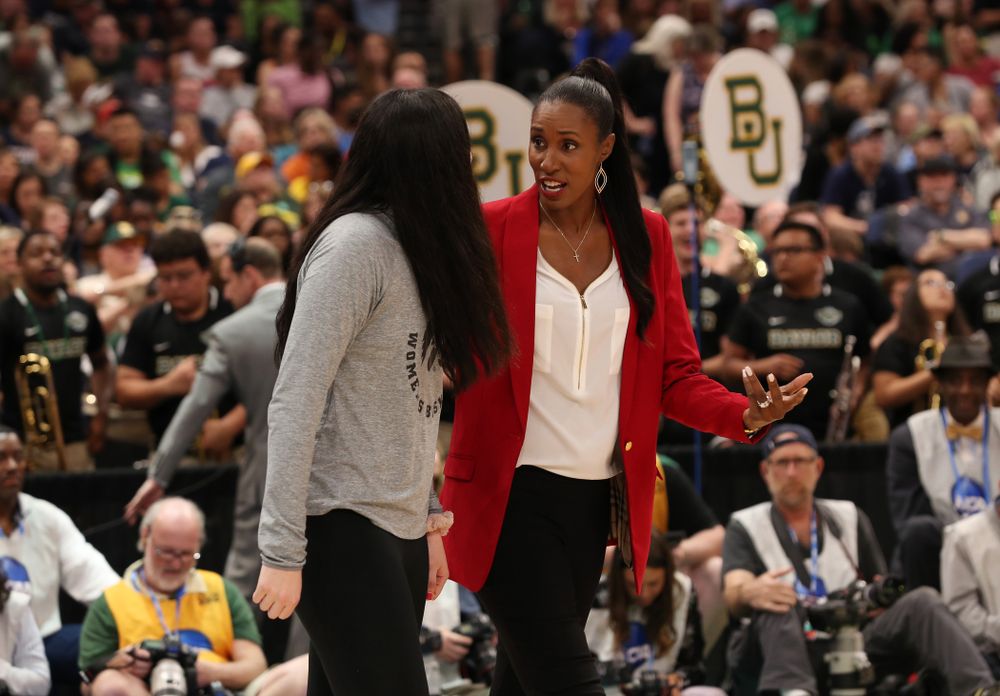 Iowa Hawkeyes forward Megan Gustafson (10) is introduced with Lisa Leslie and the other members of the Naismith Starting 5 during a timeout in the second half of the National Semi-Final between Baylor and Oregon Friday, April 5, 2019 at Amalie Arena in Tampa, FL. (Brian Ray/hawkeyesports.com)
