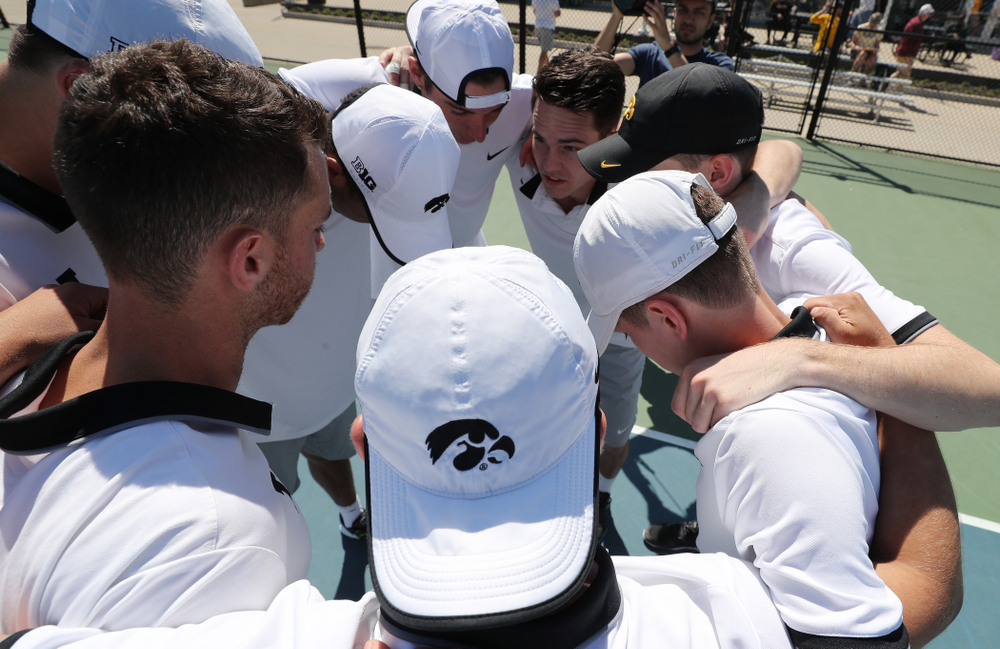 IowaÕs Jonas Larsen pumps up his teammates before their game against the Michigan Wolverines Sunday, April 21, 2019 at the Hawkeye Tennis and Recreation Complex. (Brian Ray/hawkeyesports.com)