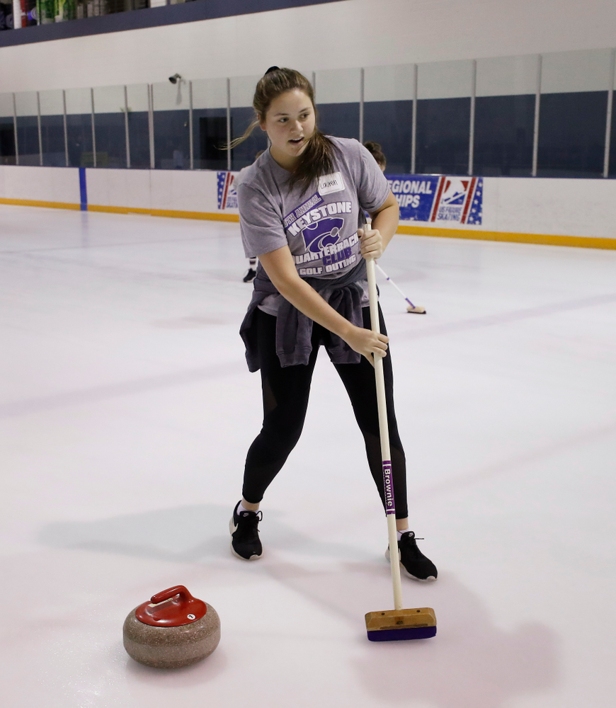 Members of the Iowa Softball team learn the sport of curling as part of a team building event Wednesday, January 10, 2018 at the Cedar Rapids Ice Arena. (Brian Ray/hawkeyesports.com)
