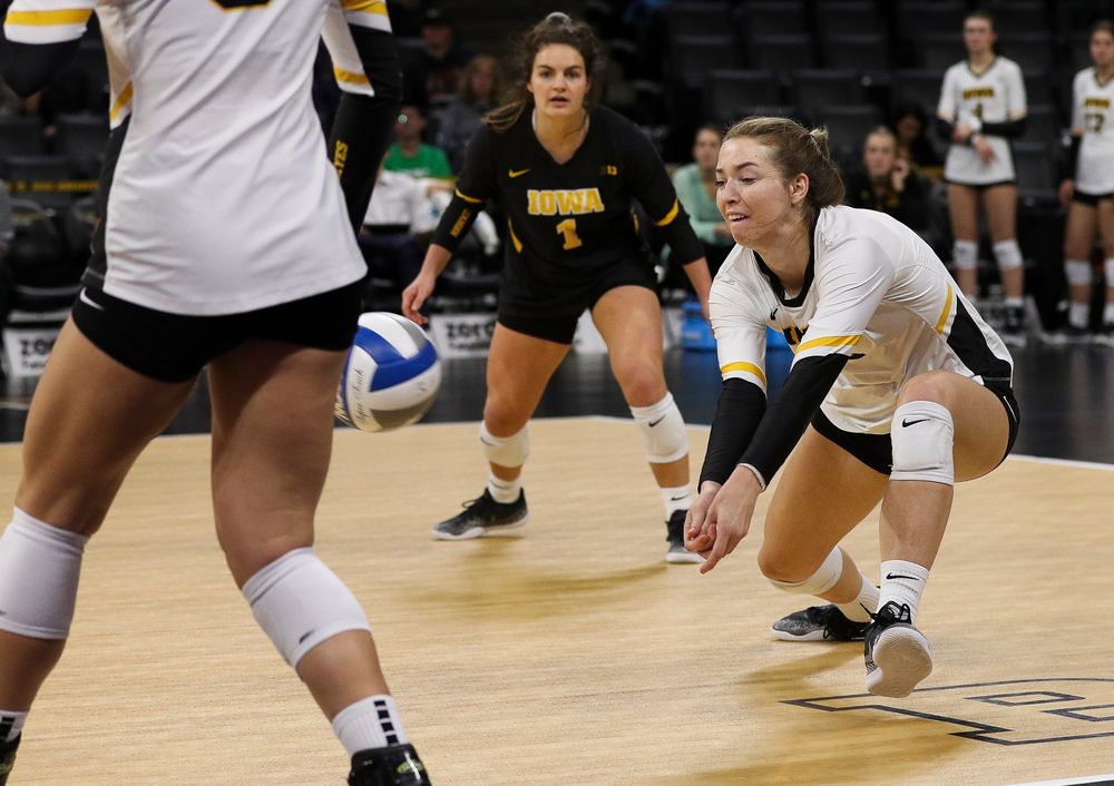 Iowa Hawkeyes outside hitter Meghan Buzzerio (5) bumps the ball during a match against Nebraska at Carver-Hawkeye Arena on November 7, 2018. (Tork Mason/hawkeyesports.com)