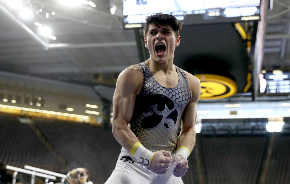 Iowa’s Evan Davis competes on the high bar against UIC and Minnesota Saturday, February 1, 2020 at Carver-Hawkeye Arena. (Brian Ray/hawkeyesports.com)
