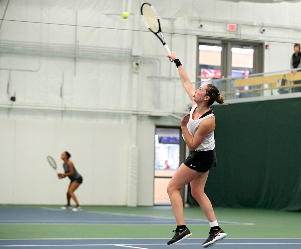 Iowa’s Samantha Mannix returns a shot during her singles match at the Hawkeye Tennis and Recreation Complex in Iowa City on Sunday, February 23, 2020. (Stephen Mally/hawkeyesports.com)