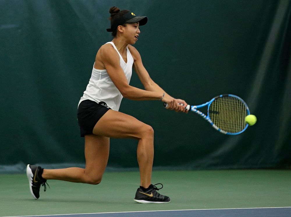 Iowa’s Michelle Bacalla returns a shot during her singles match at the Hawkeye Tennis and Recreation Complex in Iowa City on Sunday, February 23, 2020. (Stephen Mally/hawkeyesports.com)