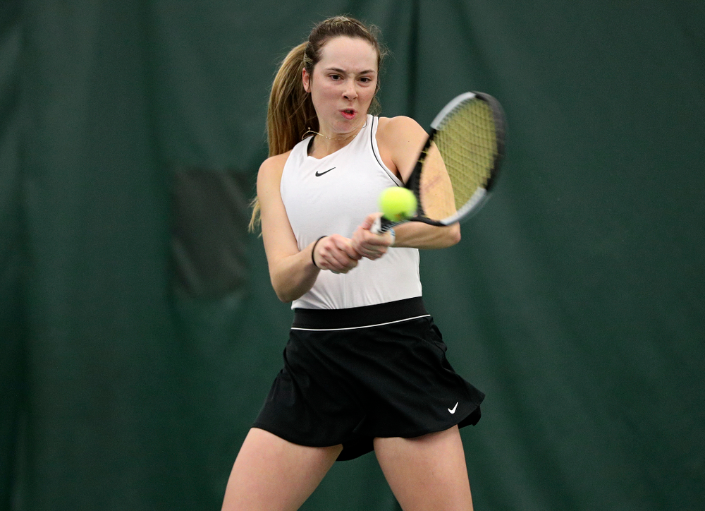 Iowa’s Samantha Mannix returns a shot during her doubles match at the Hawkeye Tennis and Recreation Complex in Iowa City on Sunday, February 16, 2020. (Stephen Mally/hawkeyesports.com)