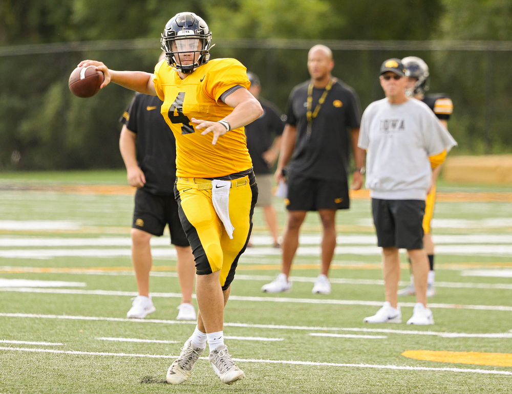 Iowa Hawkeyes quarterback Nate Stanley (4) throws on the run during Fall Camp Practice No. 10 at the Hansen Football Performance Center in Iowa City on Tuesday, Aug 13, 2019. (Stephen Mally/hawkeyesports.com)