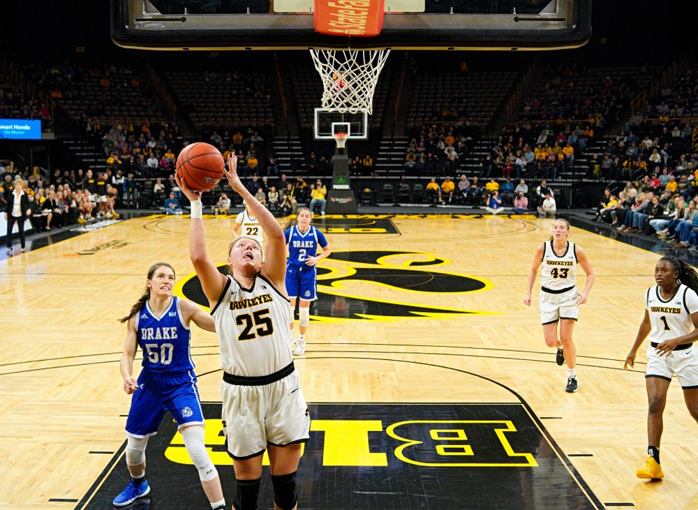 Iowa Hawkeyes forward Monika Czinano (25) scores a basket during the second quarter of their game at Carver-Hawkeye Arena in Iowa City on Saturday, December 21, 2019. (Stephen Mally/hawkeyesports.com)