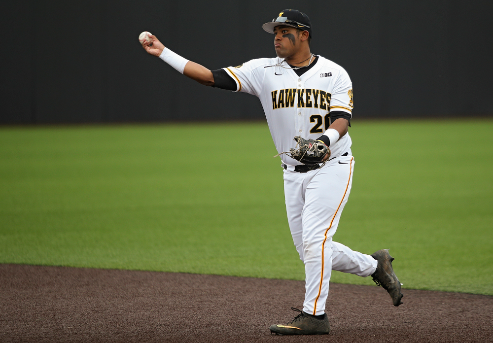 Iowa second baseman Izaya Fullard (20) throws to first base for an out during the first inning of their college baseball game at Duane Banks Field in Iowa City on Wednesday, March 11, 2020. (Stephen Mally/hawkeyesports.com)