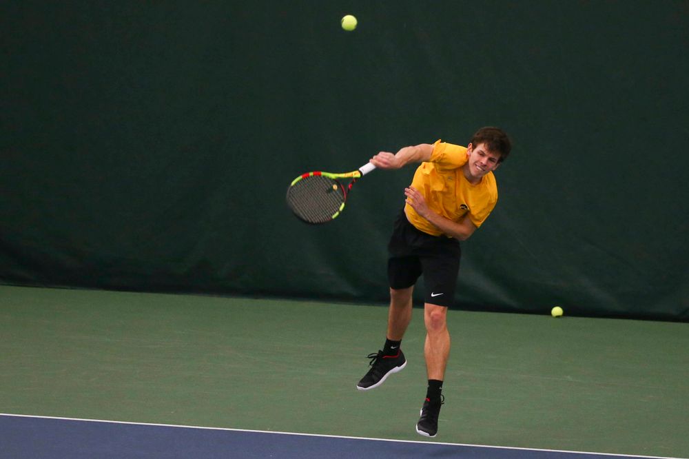 Iowa's Joe Tyler at a tennis match vs Drake Friday, March 8, 2019 at the Hawkeye Tennis and Recreation Complex. (Lily Smith/hawkeyesports.com)