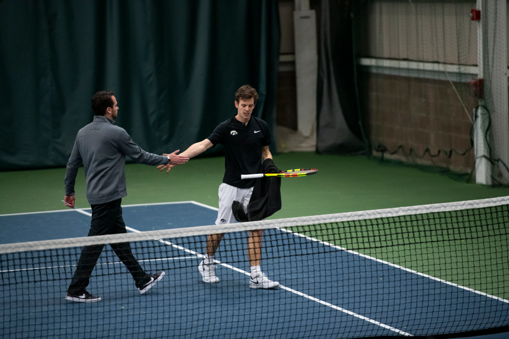 The Iowa men's tennis team competes against Cornell in The Rise Tennis Center in Ithaca, NY on Sunday, Feb. 24, 2019.