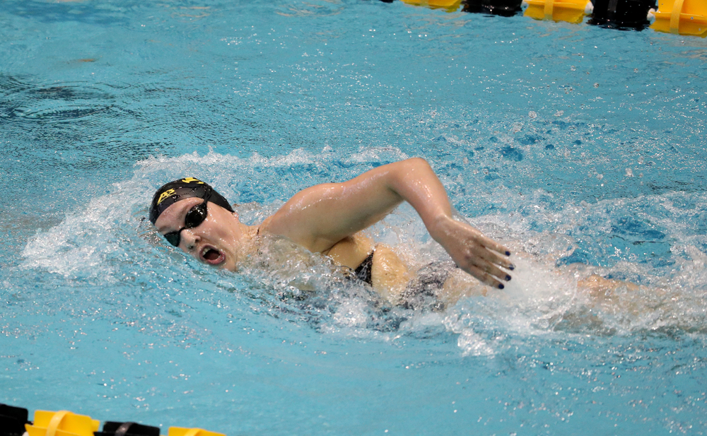 IowaÕs Emily Sansome competes in the 1000-yard freestyle against Notre Dame and Illinois Saturday, January 11, 2020 at the Campus Recreation and Wellness Center. (Brian Ray/hawkeyesports.com)
