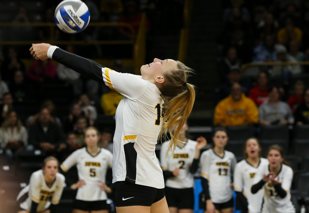 Iowa Hawkeyes outside hitter Cali Hoye (14) bumps the ball during a game against Purdue at Carver-Hawkeye Arena on October 13, 2018. (Tork Mason/hawkeyesports.com)