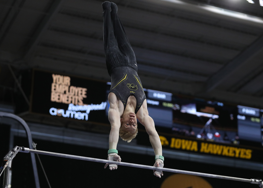 Iowa's Nick Merryman competes on the high bar against the Ohio State Buckeyes Saturday, March 16, 2019 at Carver-Hawkeye Arena. (Brian Ray/hawkeyesports.com)