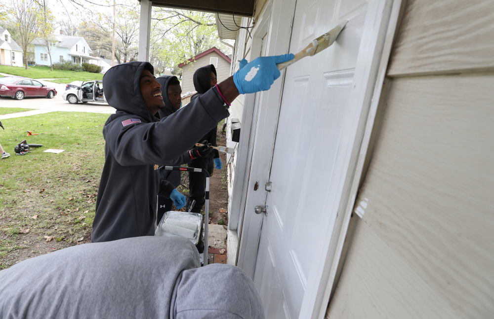 Members of the Hawkeye Football team volunteer at United Action for Youth during the annual Iowa Athletics Day of Caring Sunday, April 28, 2019 in Iowa City. (Brian Ray/hawkeyesports.com)