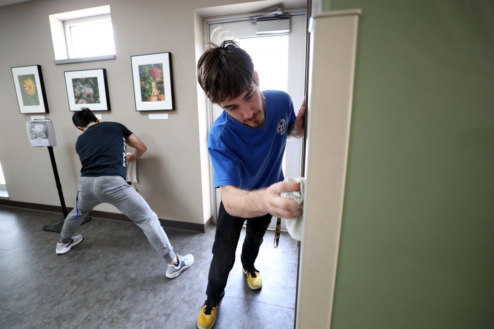 Members of the MenÕs Gymnastics team volunteer at CommUnity Crisis Services and Food Bank during the annual Iowa Athletics Day of Caring Sunday, April 28, 2019 in Iowa City. (Brian Ray/hawkeyesports.com)
