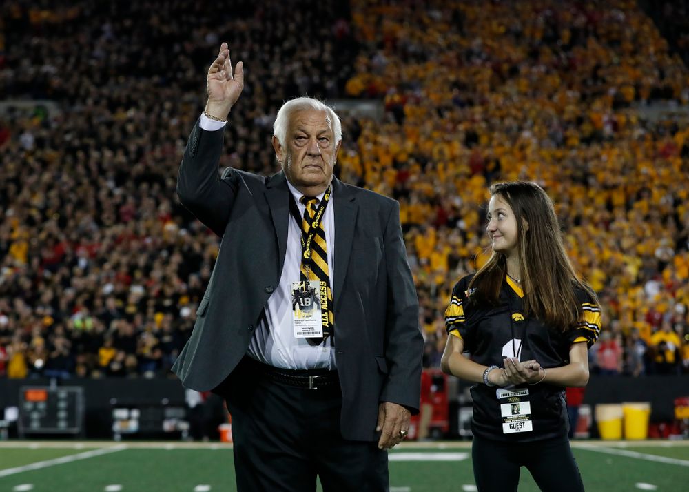 Honorary Captain Tom Moore and Kid Captain Kiersten Mann before the Iowa Hawkeyes game against the Wisconsin Badgers Saturday, September 22, 2018 at Kinnick Stadium. (Brian Ray/hawkeyesports.com)