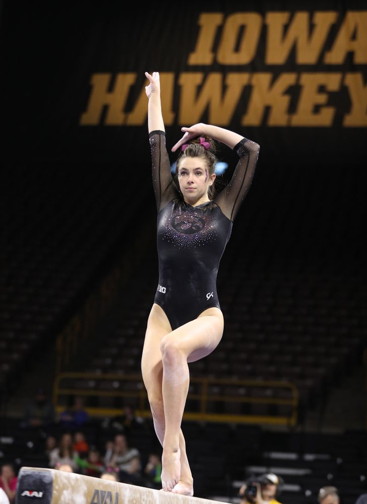 Iowa's Bridget Killian competes on the beam during their meet against the Minnesota Golden Gophers Saturday, January 19, 2019 at Carver-Hawkeye Arena. (Brian Ray/hawkeyesports.com)