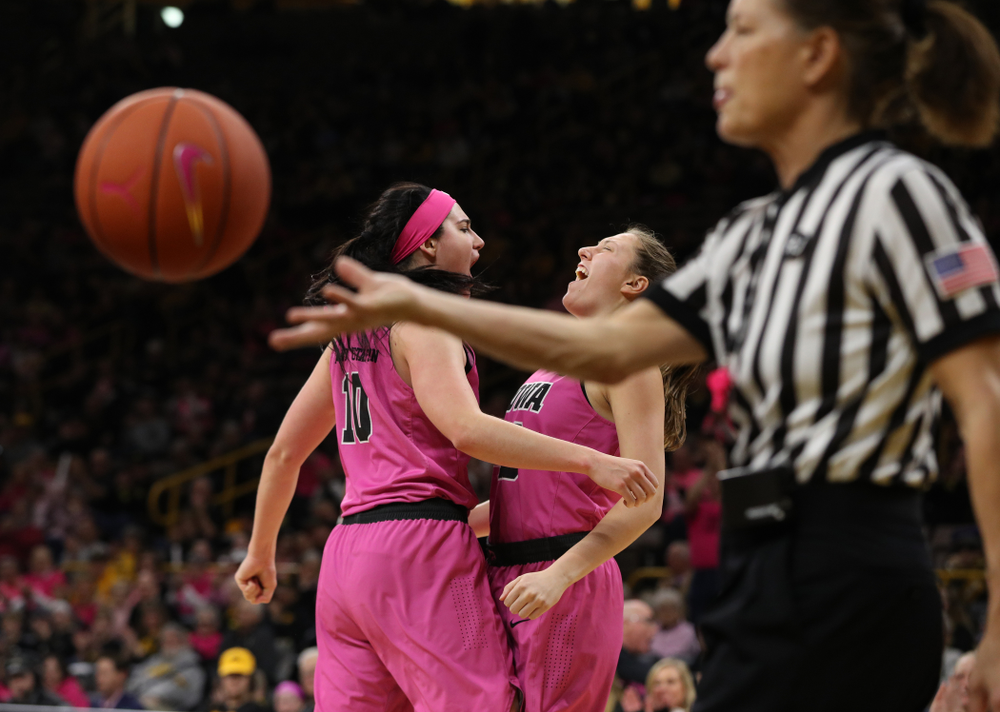 Iowa Hawkeyes forward Megan Gustafson (10) and forward Amanda Ollinger (43) against the seventh ranked Maryland Terrapins Sunday, February 17, 2019 at Carver-Hawkeye Arena. (Brian Ray/hawkeyesports.com)