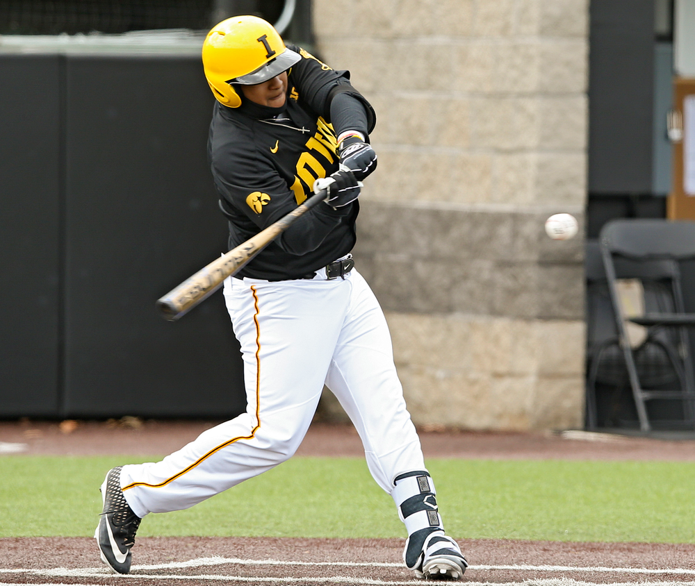 Iowa Hawkeyes first baseman Izaya Fullard (20) bats during the first inning of their game against Illinois at Duane Banks Field in Iowa City on Saturday, Mar. 30, 2019. (Stephen Mally/hawkeyesports.com)