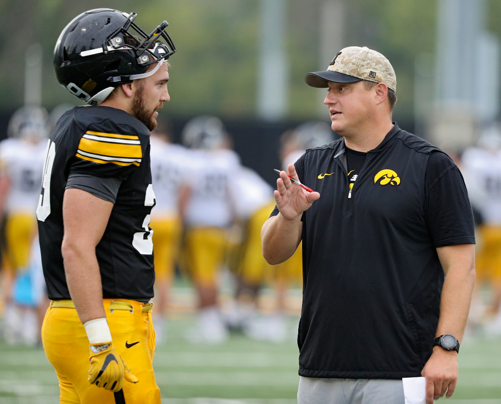 Iowa Hawkeyes tight end Nate Wieting (39) talks with offensive coordinator Brian Ferentz durning Fall Camp Practice No. 17 at the Hansen Football Performance Center in Iowa City on Wednesday, Aug 21, 2019. (Stephen Mally/hawkeyesports.com)