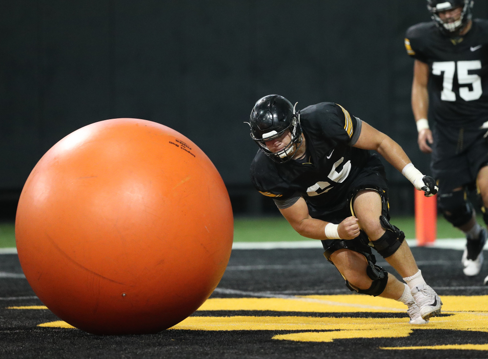 Iowa Hawkeyes offensive lineman Tyler Linderbaum (65) during Fall Camp Practice No. 16 Tuesday, August 20, 2019 at the Ronald D. and Margaret L. Kenyon Football Practice Facility. (Brian Ray/hawkeyesports.com)
