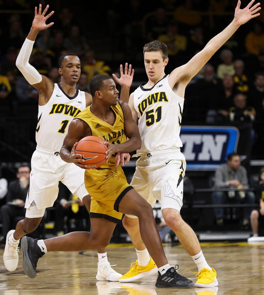 Iowa Hawkeyes guard Maishe Dailey (1) and Iowa Hawkeyes forward Nicholas Baer (51) trap a ballhandler during a game against Alabama State at Carver-Hawkeye Arena on November 21, 2018. (Tork Mason/hawkeyesports.com)