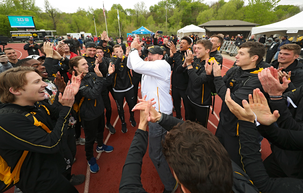 Iowa Director of Track and Field Joey Woody celebrates with his team after winning the Men's Big Ten Outdoor Track and Field Championships on the third day of the Big Ten Outdoor Track and Field Championships at Francis X. Cretzmeyer Track in Iowa City on Sunday, May. 12, 2019. (Stephen Mally/hawkeyesports.com)