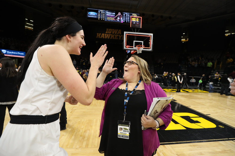 Iowa Hawkeyes forward Megan Gustafson (10) and SID Brandee Britt against the Illinois Fighting Illini Thursday, February 14, 2019 at Carver-Hawkeye Arena. (Brian Ray/hawkeyesports.com)
