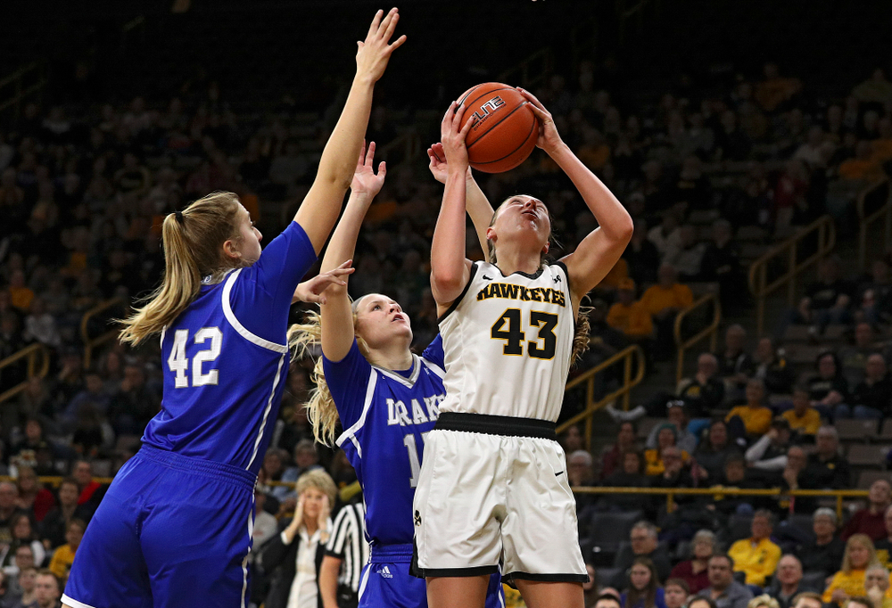 Iowa Hawkeyes forward Amanda Ollinger (43) puts up a shot during the fourth quarter of their game at Carver-Hawkeye Arena in Iowa City on Saturday, December 21, 2019. (Stephen Mally/hawkeyesports.com)