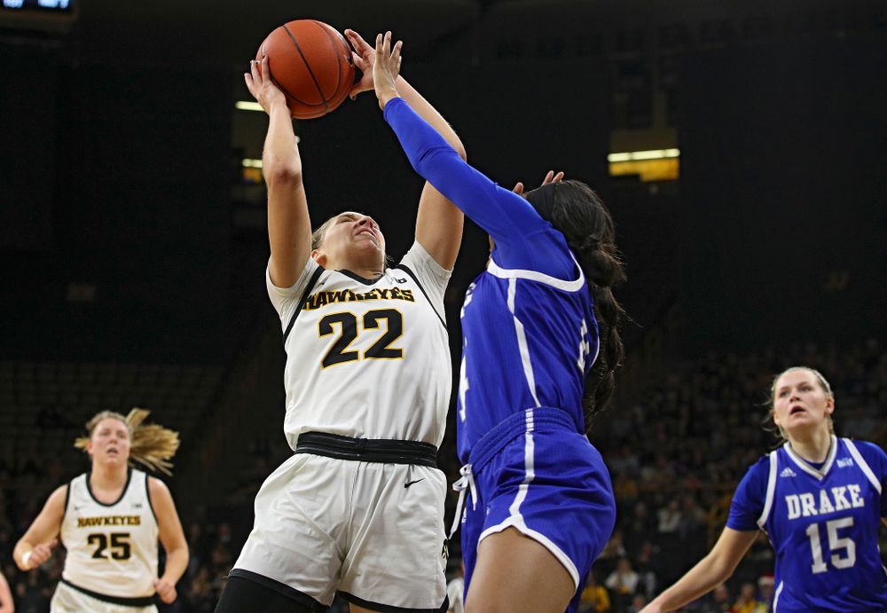 Iowa Hawkeyes guard Kathleen Doyle (22) makes a basket during the first quarter of their game at Carver-Hawkeye Arena in Iowa City on Saturday, December 21, 2019. (Stephen Mally/hawkeyesports.com)