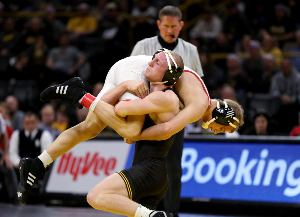 Iowa’s Kaleb Young wrestles Nebraska’s Peyton Rob at 157 pounds Saturday, January 18, 2020 at Carver-Hawkeye Arena. Young won the match 6-4. (Brian Ray/hawkeyesports.com)