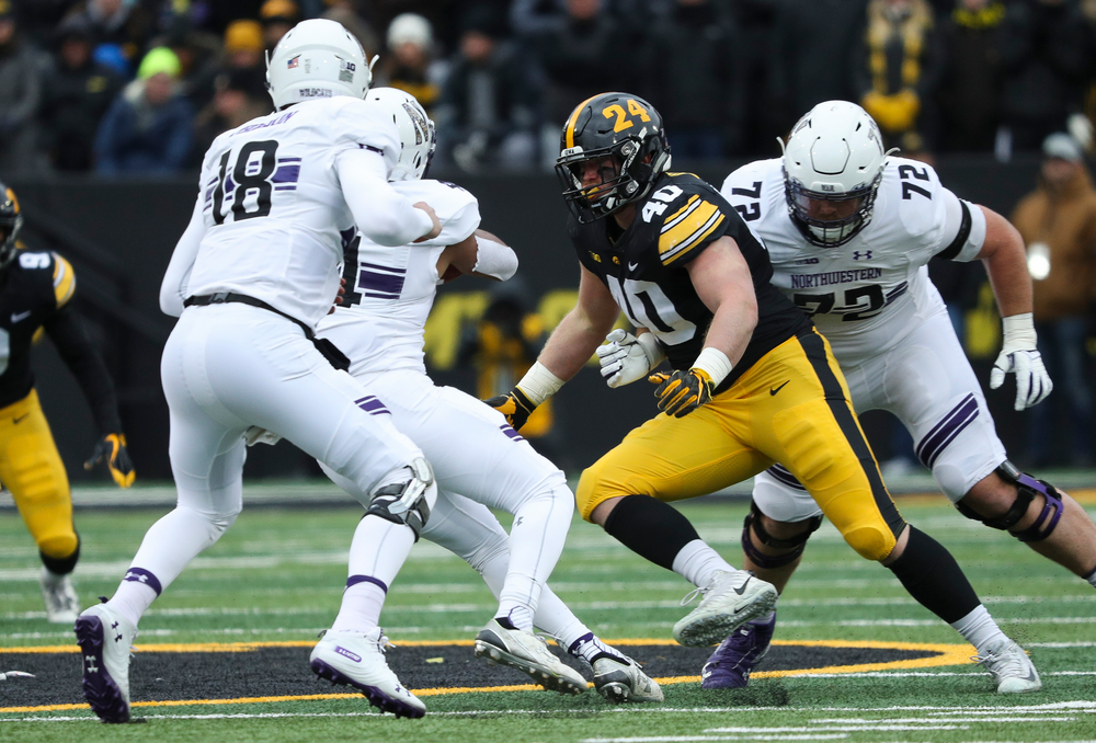 Iowa Hawkeyes defensive end Parker Hesse (40) rushes the quarterback during a game against Northwestern at Kinnick Stadium on November 10, 2018. (Tork Mason/hawkeyesports.com)