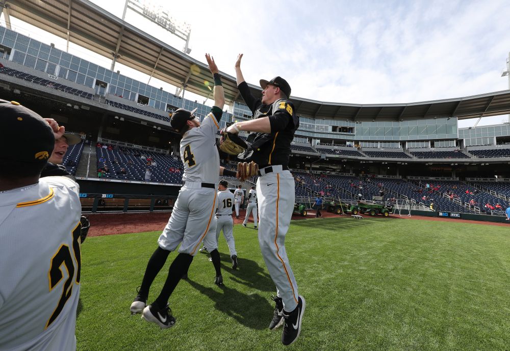 Iowa Hawkeyes infielder Mitchell Boe (4) and Shane Ritter (18) against the Indiana Hoosiers in the first round of the Big Ten Baseball Tournament Wednesday, May 22, 2019 at TD Ameritrade Park in Omaha, Neb. (Brian Ray/hawkeyesports.com)