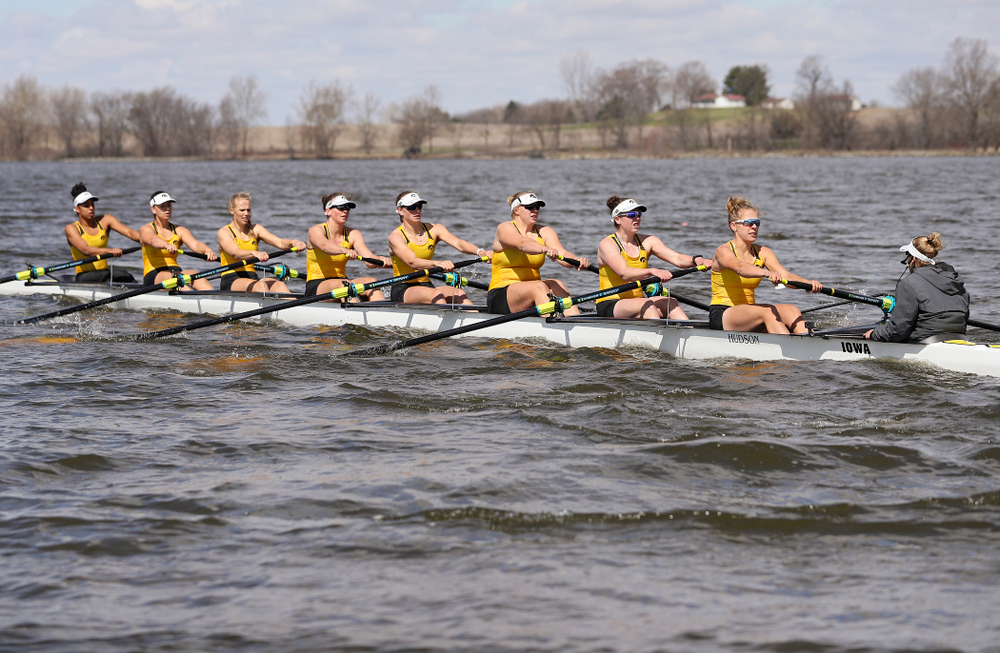 Iowa's Naomi Visser (from left), Elena Waiglein, Paige Schlapkohl, Hannah Greenlee, Hunter Koenigsfeld, Contessa Harold, Katie Pearson, Eve Stewart, and Logan Jones during their 1 Varsity 8 race against Wisconsin in their Big Ten Double Dual Rowing Regatta at Lake Macbride in Solon on Saturday, Apr. 13, 2019. (Stephen Mally/hawkeyesports.com)