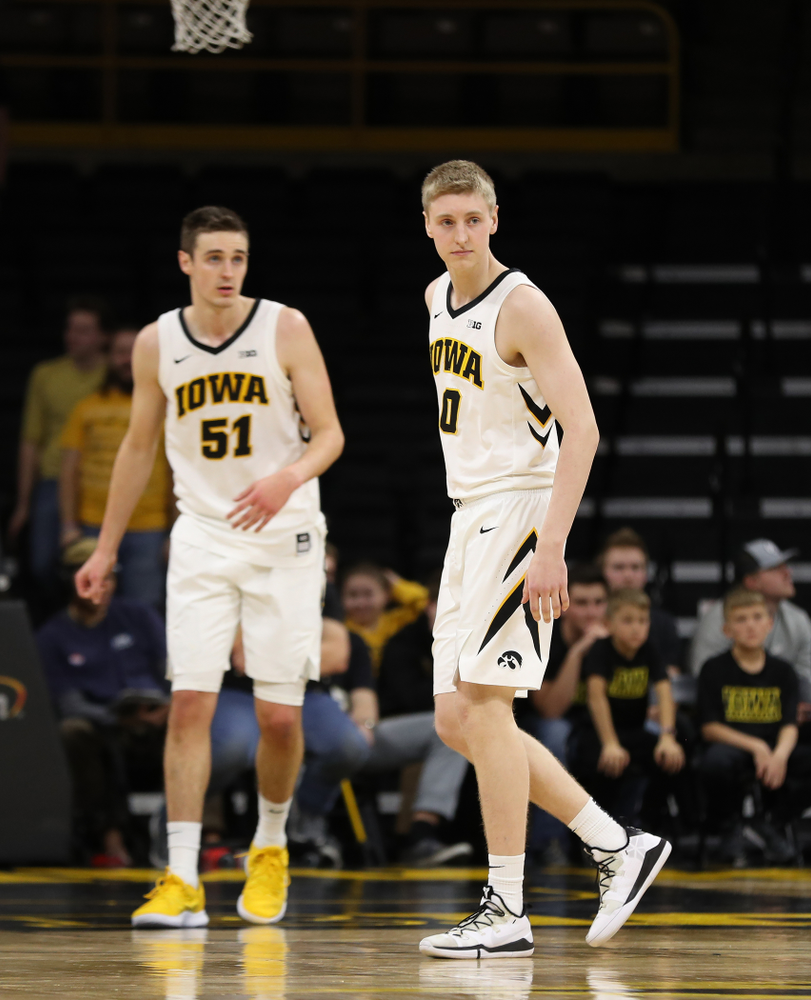 Iowa Hawkeyes forward Michael Baer (0) and forward Nicholas Baer (51) against the Western Carolina Catamounts Tuesday, December 18, 2018 at Carver-Hawkeye Arena. (Brian Ray/hawkeyesports.com)