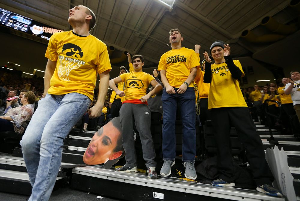 Iowa Hawkeyes students cheer during a game against Wisconsin on November 30, 2018, at Carver-Hawkeye Arena. (Tork Mason/hawkeyesports.com)